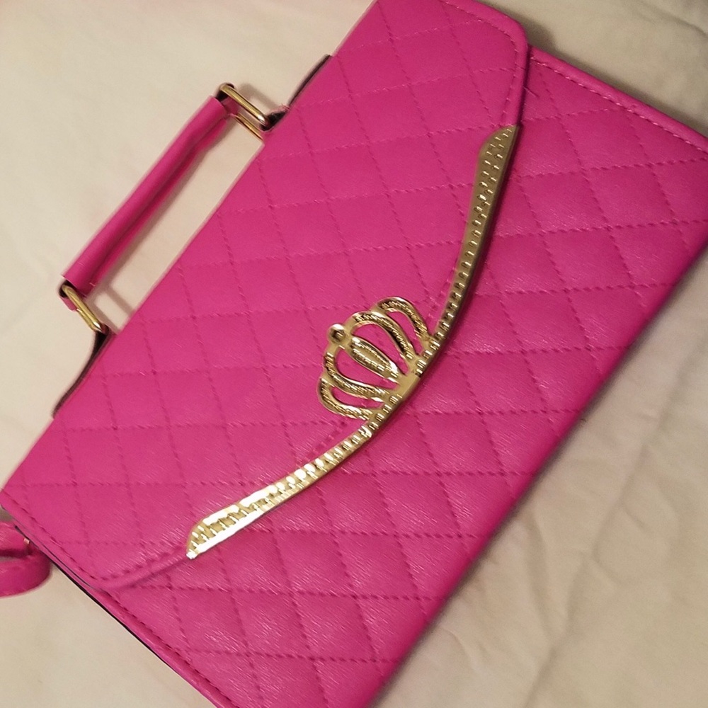 Pink quilted leather handbag